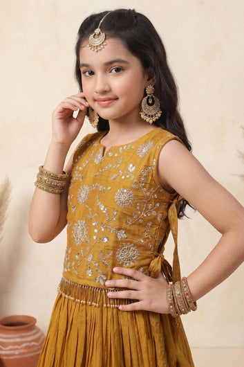 Girl's Brown Silk Blend Embroidered Sleeveless Top Style Choli with Side Knot and Flared Lehenga For Traditional Look