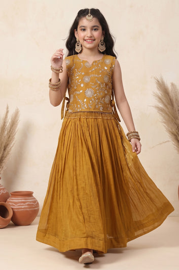 Girl's Brown Silk Blend Embroidered Sleeveless Top Style Choli with Side Knot and Flared Lehenga For Traditional Look