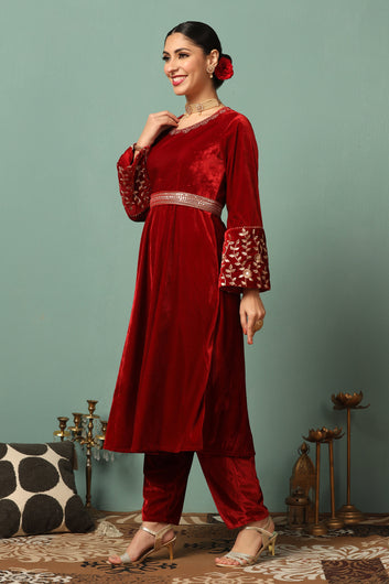 Womens Maroon Velvet Solid Ankle Length Flared Kurta With Trouser Set