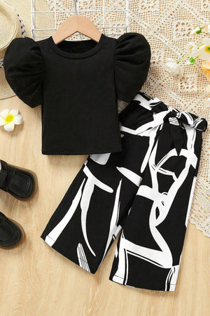 Girls Black Rib Lycra Solid Top And Printed Pant Set