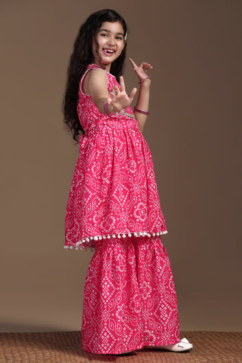 Girls Pink Cotton Blend Printed Peplum Style Kurta With Sharara Set