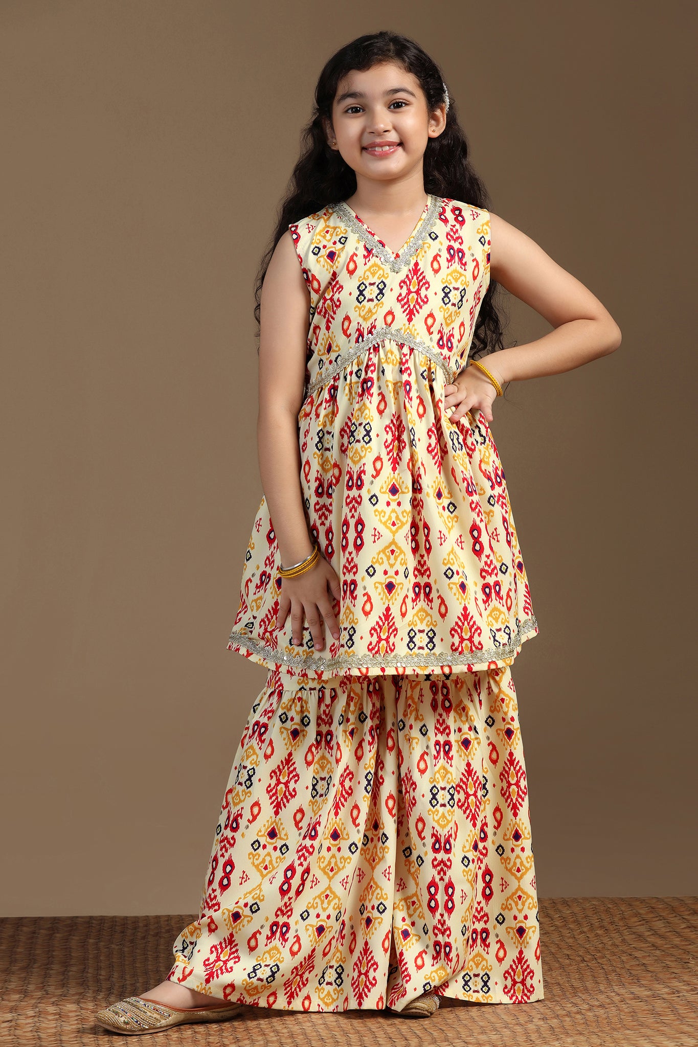 Girls Yellow Cotton Blend Ajrakh Printed Empire Waist Kurta With Sharara Set