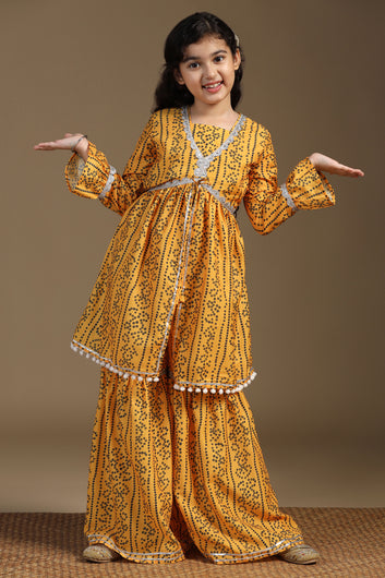 Girls Yellow Cotton Blend Printed Peplum Style Kurta With Sharara Set